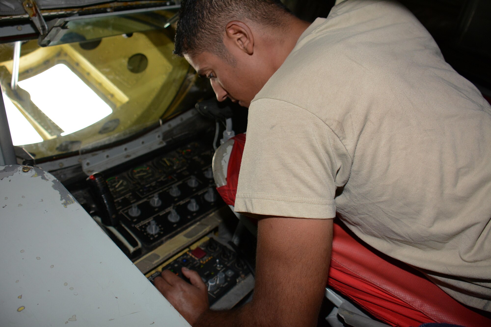 Senior Airman Michael Velazquez, 340th Expeditionary Aircraft Maintenance Unit hydraulics journeyman from Rochester, New York, conducts a check of the multi-purpose refueling system pod in the back of a KC-135 Stratotanker at Al Udeid Air Base, Qatar, Dec. 30, 2015. Velazquez and several airmen from the 340th EAMU hydraulics team installed the MPRS on the aircraft so the plane can refuel any aircraft supporting Operation Inherent Resolve. (U.S. Air Force photo by Tech. Sgt. James Hodgman/Released)