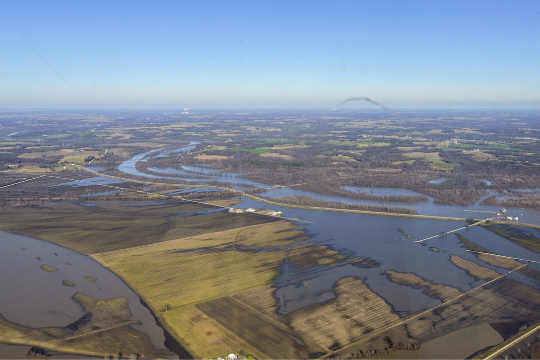 An aerial view from a Coast Guard HC-144 Ocean Sentry shows flooding and high water from New Madrid, Mo., to Chester, Ill., Jan. 1, 2016. The helicopter crew and Marine Safety Unit Paducah responders surveyed the flooding. U.S. Coast Guard photo by Petty Officer 1st Class Timothy Tamargo