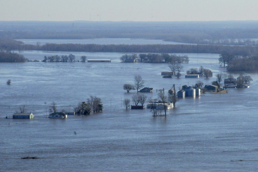 Coast Guard MH-65 Dolphin helicopter crews observe areas affected by the high water and flooding near Cape Girardeau, Mo., Jan. 3, 2016. Coast Guard crews used Cape Girardeau for search and rescue platforms and to monitor high water and flooding in the region. Coast Guard photo by Petty Officer 2nd Class Seth Johson