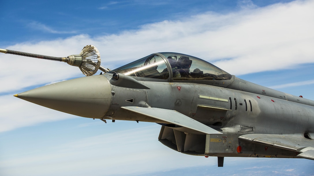 A Eurofighter Typhoon with the Spanish Air Force based out of Morón Air Base, Spain, refuels from a KC-130J Hercules, a first for the Marines from Special-Purpose Marine Air-Ground Task Force Crisis Response-Africa, Aug. 13, in Spain. The U.S. and Spain have been fostering one of the closest defense partnerships around the world for more than 60 years.