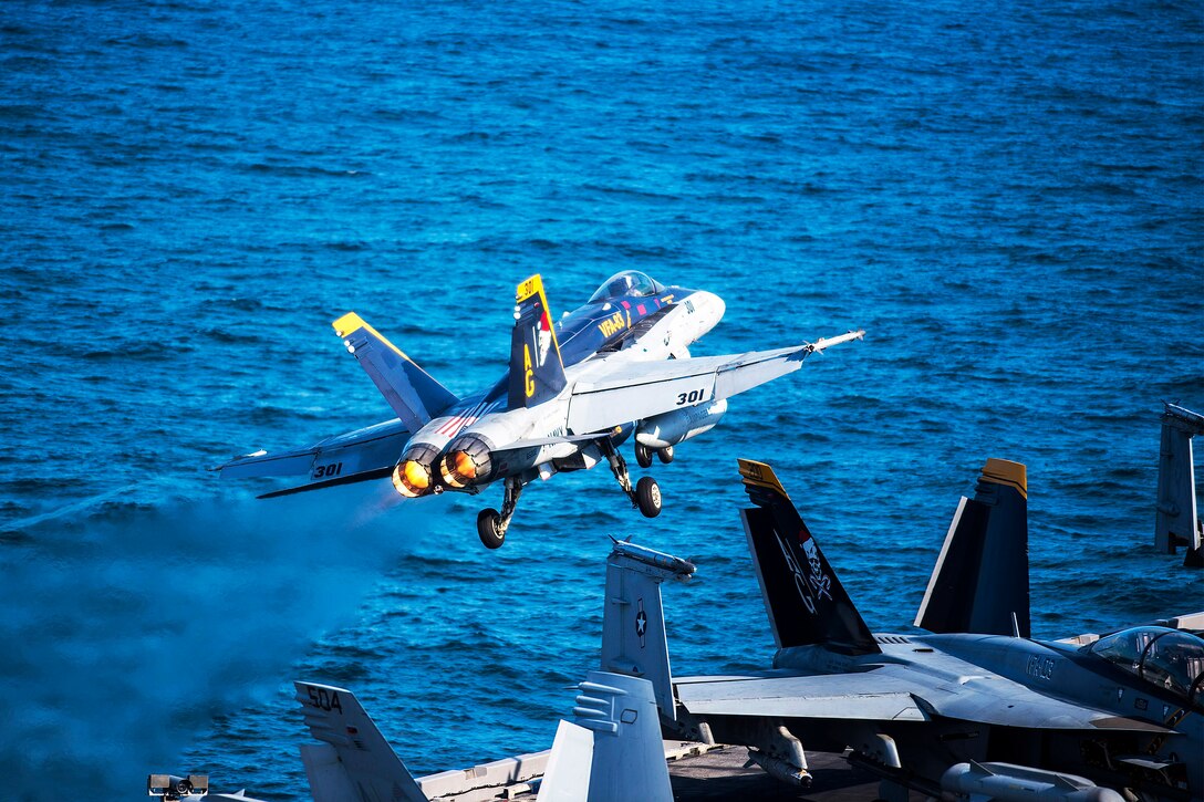 An F/A-18C Hornet launches from the flight deck of aircraft carrier USS Harry S. Truman in the Arabian Gulf, Dec. 31, 2015. The Harry S. Truman Carrier Strike Group is deployed in support of Operation Inherent Resolve, maritime security operations and theater security cooperation efforts in the U.S. 5th Fleet area of operations. The hornet is part of the “Rampagers” of Strike Fighter Squadron 83. U.S. Navy photo by Petty Officer 3rd Class J. R. Pacheco