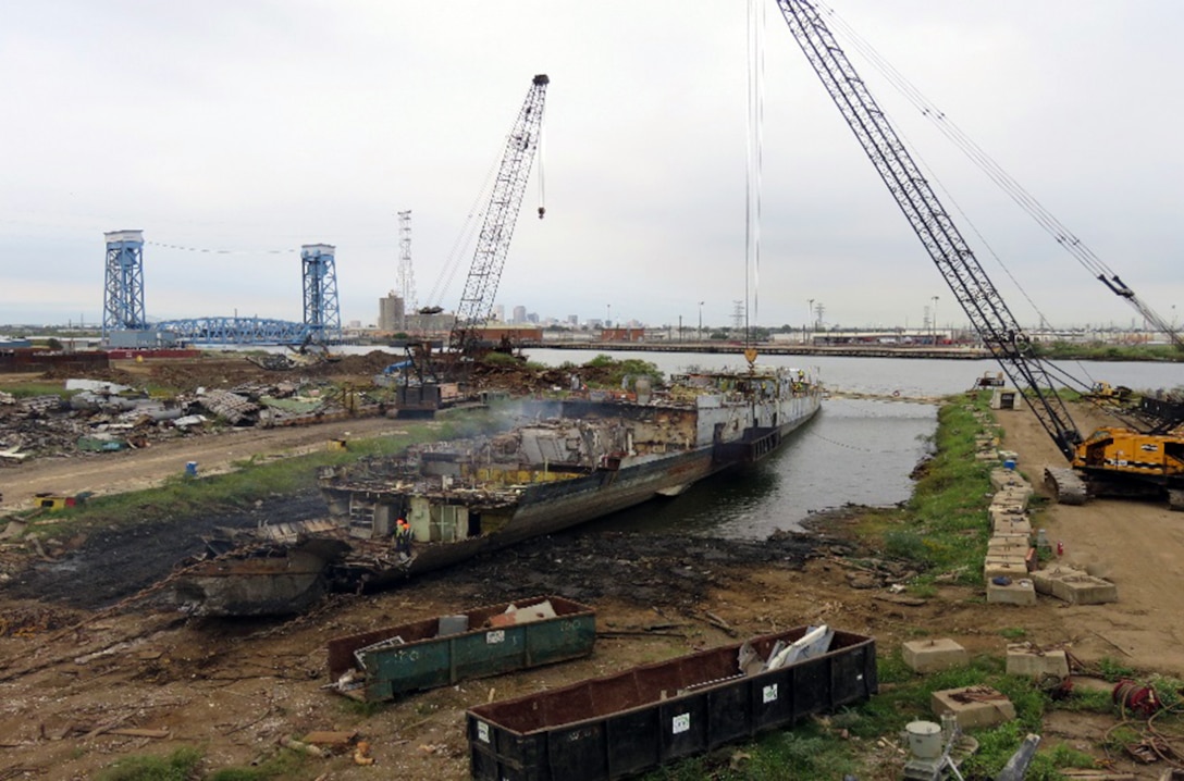 The USS Forrest Sherman, a former Navy destroyer, sits in a trench in New Orleans in October. The ship is the first scrapped through a Defense Logistics Agency contract since the late 1990s.