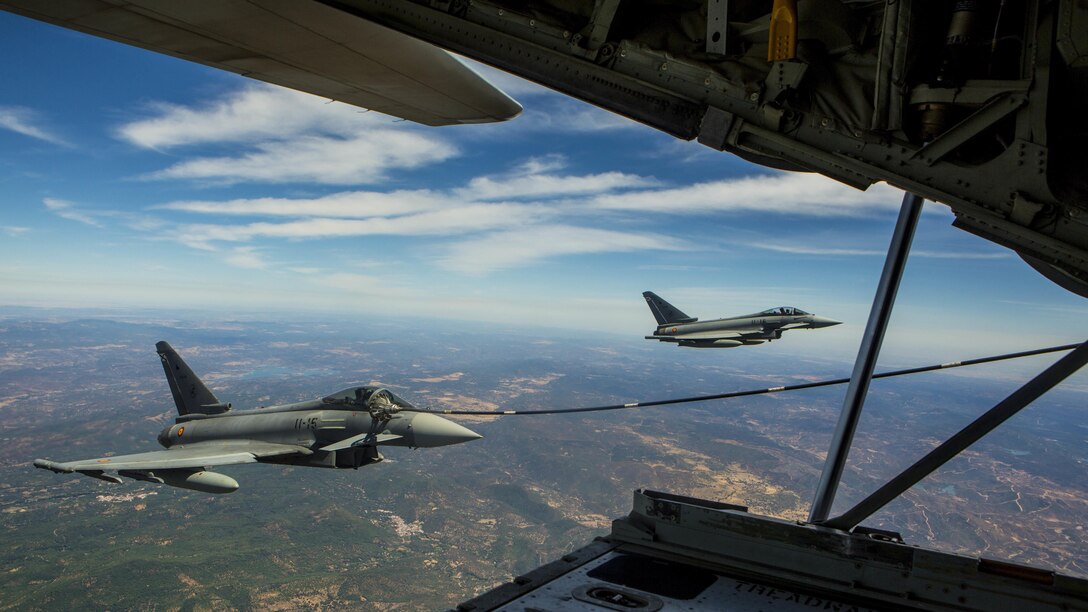 A Eurofighter Typhoon with the Spanish Air Force receives fuel from a U.S. Marine KC-130J Hercules with Special-Purpose Marine Air-Ground Task Force Crisis Response-Africa, August 13, in Spain. A total of five Spanish pilots and their aircraft had the opportunity to practice their air-to-air refueling skills with the Marines from SPMAGTF-CR-AF. While this particular training was a first for the two countries, the U.S. and Spain work together routinely, fostering one of the closest defense partnerships around the world.