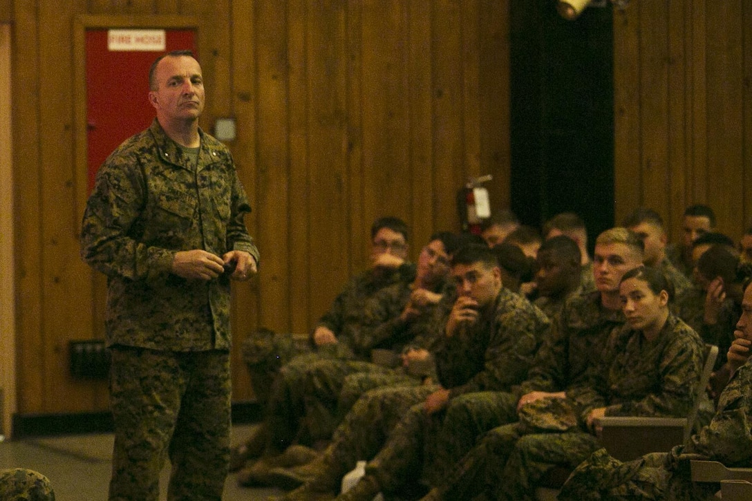 Brigadier General Charles G. Chiarotti, the commanding general of 2nd Marine Logistics Group, speaks to service members with the 2nd MLG, during a suicide prevention and awareness brief at the base theater at Camp Lejeune, N.C. Dec. 14, 2015. The 2nd MLG conducted the presentation in order to create a command climate of prevention of suicides, suicide attempts and ideations through education and guided discussion. With an estimated national average of 22 veteran suicides a day, these briefs are designed to raise awareness among members of the military. (U.S. Marine Corps photo by Lance Cpl. Damarko Bones/released)