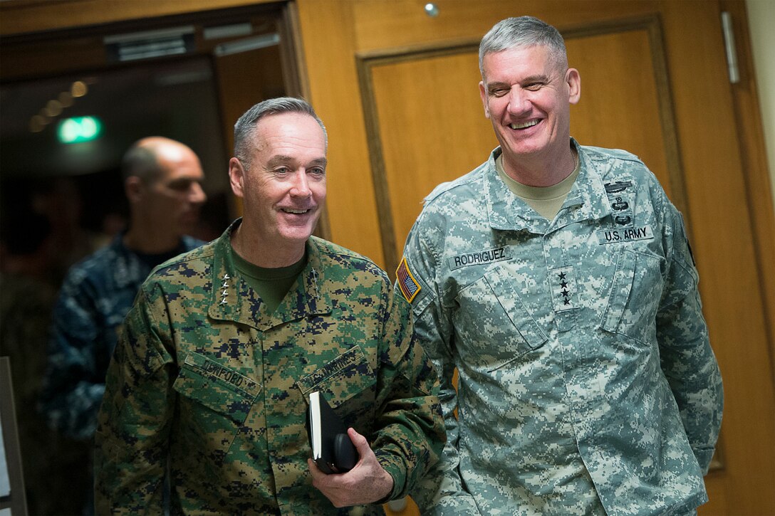 U.S. Marine Corps Gen. Joseph F. Dunford Jr., left, chairman of the Joint Chiefs of Staff, meets with U.S. Army Gen. David M. Rodriguez, commander, U.S. Africa Command, at Africom headquarters in Stuttgart, Germany, Jan. 4, 2016. DoD photo by Navy Petty Officer 2nd Class Dominique A. Pineiro