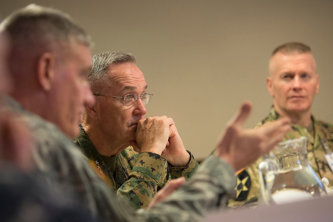 U.S. Marine Corps Gen. Joseph F. Dunford Jr., center, chairman of the Joint Chiefs of Staff, meets with U.S. Army Gen. David M. Rodriguez, commander, U.S. Africa Command, at Africom headquarters in Stuttgart, Germany, Jan. 4, 2016. DoD Photo by Navy Petty Officer 2nd Class Dominique A. Pineiro
