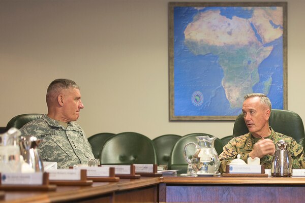 U.S. Marine Corps Gen. Joseph F. Dunford Jr., right, chairman of the Joint Chiefs of Staff, meets with U.S. Army Gen. David M. Rodriguez, commander, U.S. Africa Command, at Africom headquarters in Stuttgart, Germany, Jan. 4, 2016. DoD photo by Navy Petty Officer 2nd Class Dominique A. Pineiro