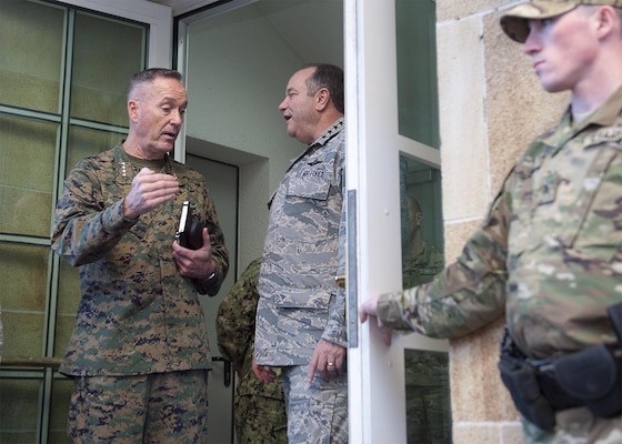 U.S. Marine Corps Gen. Joseph F. Dunford Jr., left, chairman of the Joint Chiefs of Staff, speaks with U.S. Air Force Gen. Philip M. Breedlove, commander, U.S. European Command, and Supreme Allied Commander Europe, at the Eucom headquarters in Stuttgart, Germany, Jan. 4, 2016. DoD photo by Navy Petty Officer 2nd Class Dominique A. Pineiro