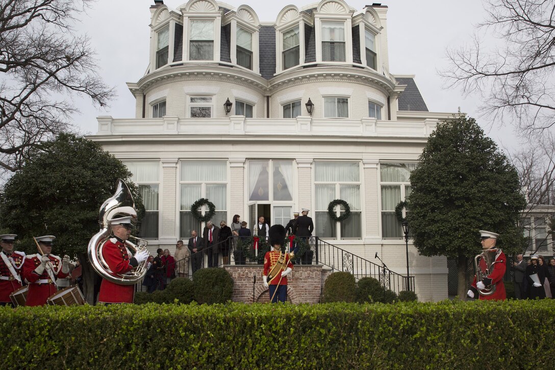 The U.S. Marine Band drum major, forms his platoon of musicians in front of the Home of the Commandants to prepare for the annual New Year’s Day serenade at Marine Barracks Washington, D.C., Jan. 1, 2016. The serenade is a tradition that has been kept since the days of the Civil War. (Official U.S. Marine Corps Photo by Cpl. Chi Nguyen/Released)