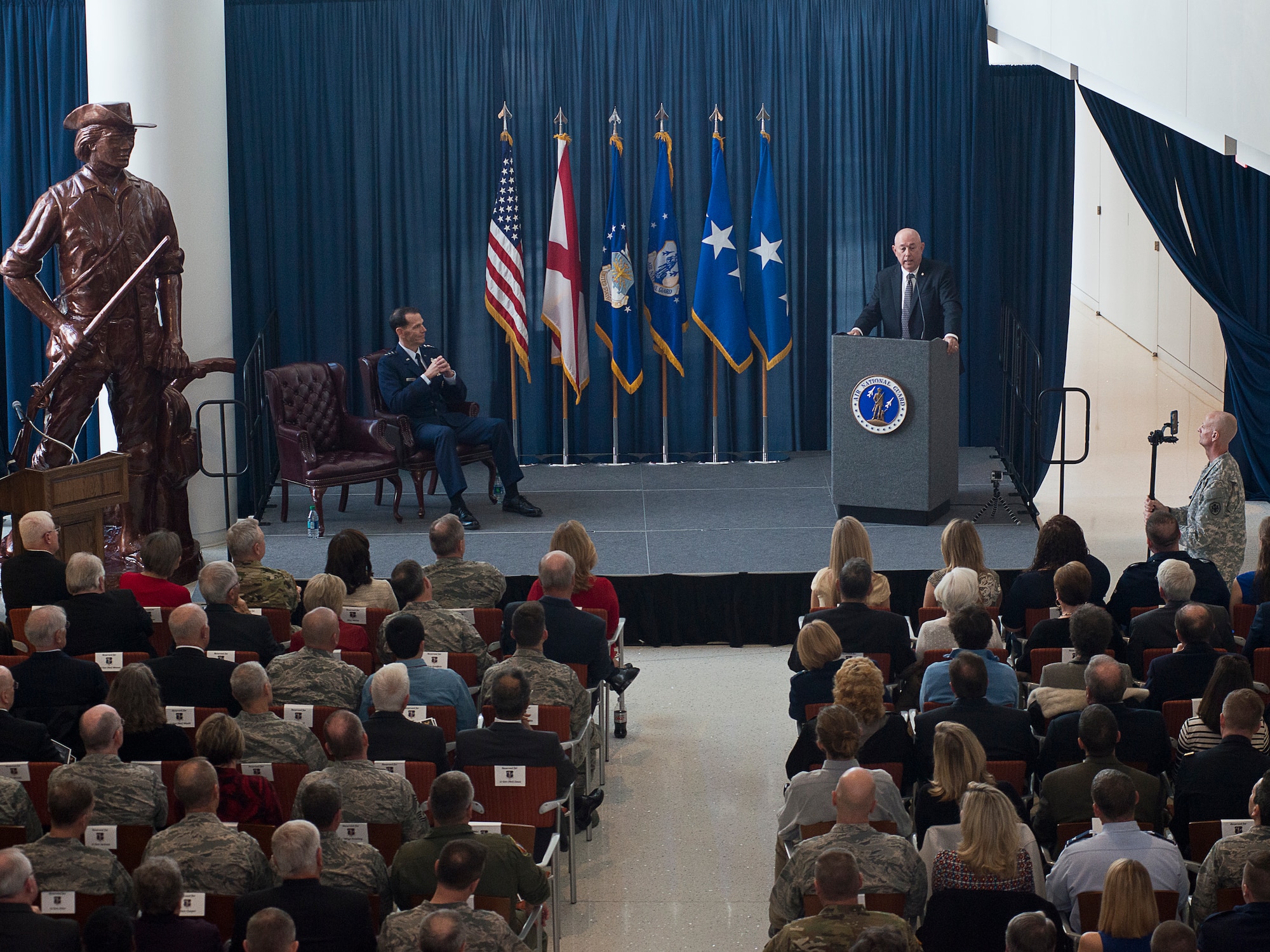 Retired General T. Michael Moseley, former Air Force chief of staff, speaks at a retirement ceremony for Lt. Gen. Stanley E. Clarke, III, Air National Guard director, held at the Air National Guard Readiness Center on Joint Base Andrews, Md., December 18, 2015. Clarke is the 15th ANG director, and has served in that position since March, 2013. (U.S. Air National Guard photo by Staff Sgt. John E. Hillier/Released)