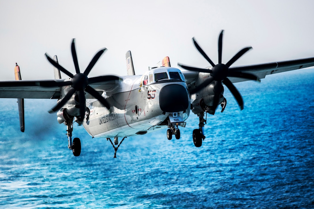 A U.S. Navy C-2A Greyhound prepares to land on the flight deck of the aircraft carrier USS Harry S. Truman in the Arabian Gulf, Dec. 31, 2015. The Harry S. Truman Carrier Strike Group is supporting Operation Inherent Resolve and other security efforts in the U.S. 5th Fleet area of responsibility. U.S. Navy photo by Petty Officer 3rd Class J. R. Pacheco