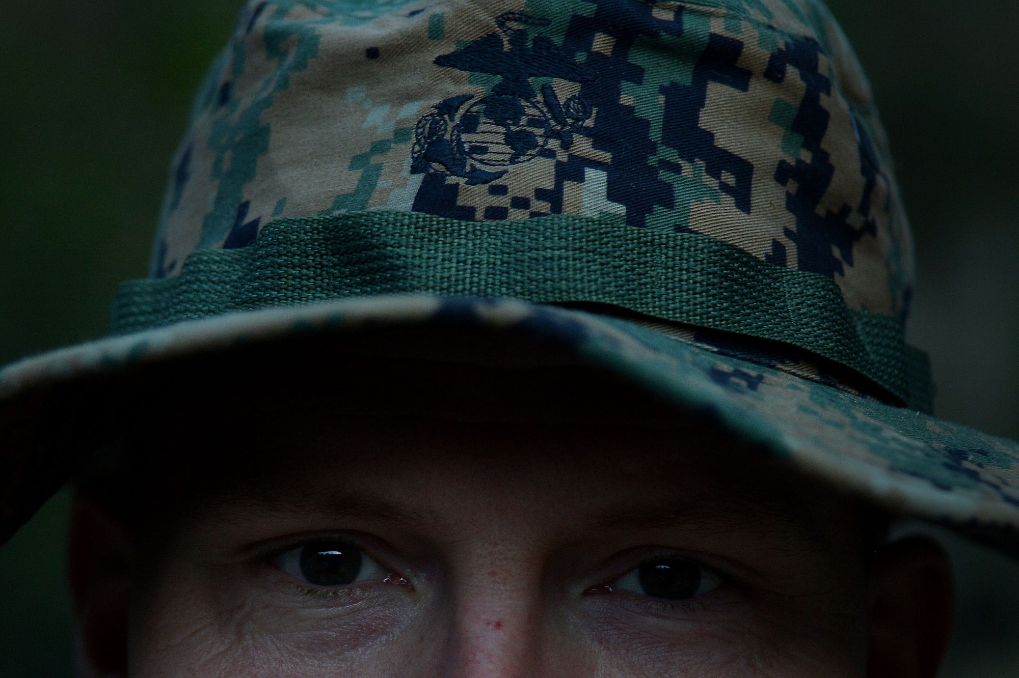 U.S. Marine Capt. Rodney Burks, Marine Aviation Logistics Squadron 31 logistics officer stationed at Marine Corps Air Station Beaufort, S.C., waits for the enemy to engage his camp Poinsett Electronic Combat Range, Wedgefield, S.C., Dec. 10, 2015. Burks was part of the enemy Red Cell team, tasked with engaging Marine Wing Support Squadron 273’s security team. (U.S. Air Force photo by Senior Airman Michael Cossaboom)