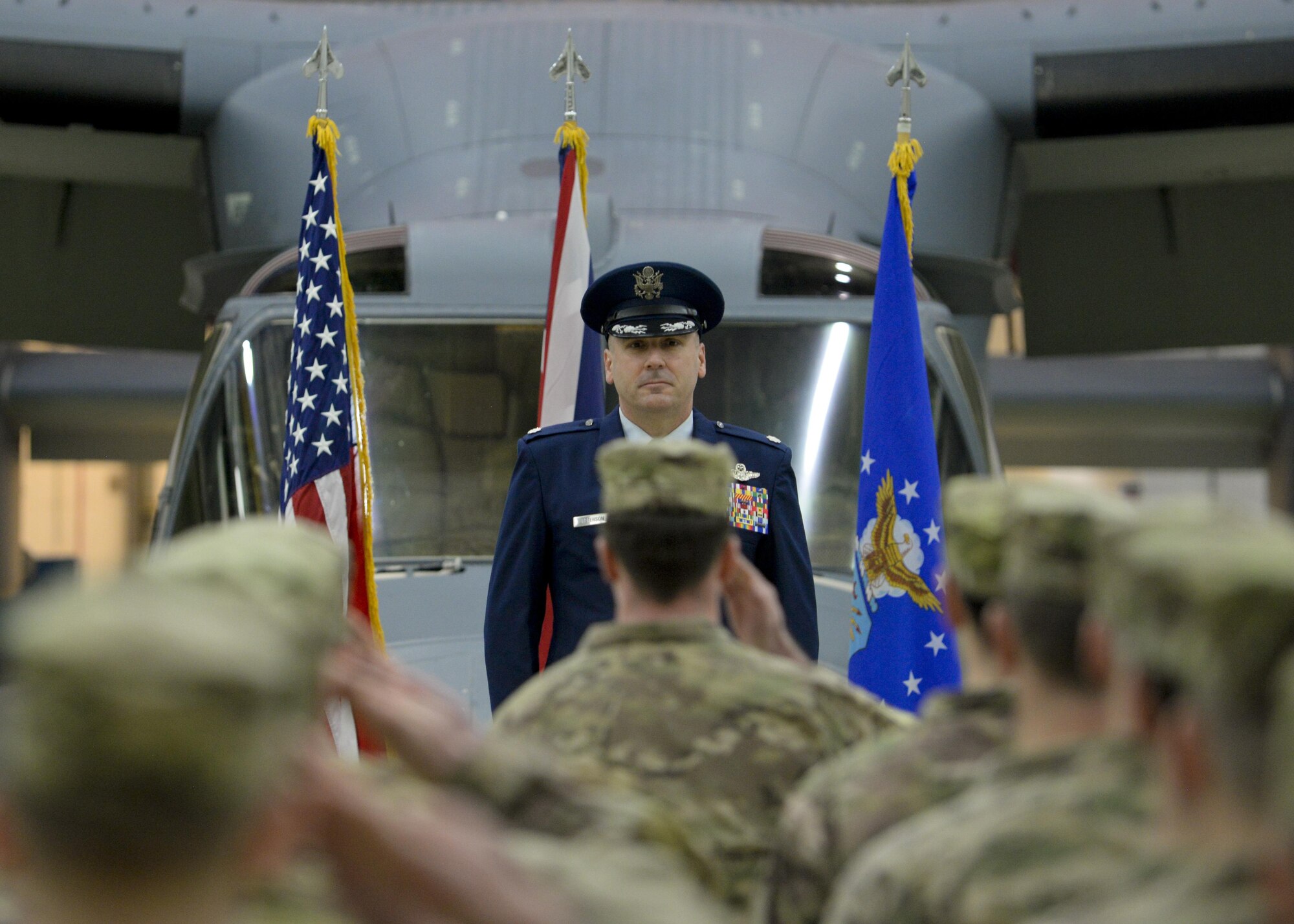 U.S. Air Force Lt. Col. James S. Peterson, incoming 7th Special Operations Squadron commander, prepares to render his first salute to the group formation during the 7th SOS change of command ceremony Jan. 5, 2016, on RAF Mildenhall, England. U.S. Air Force Lt. Col. Roy H. Oberhaus relinquished command to Peterson who previously served as the 7th SOS Director of Operations. (U.S. Air Force photo by Senior Airman Victoria H. Taylor/Released)