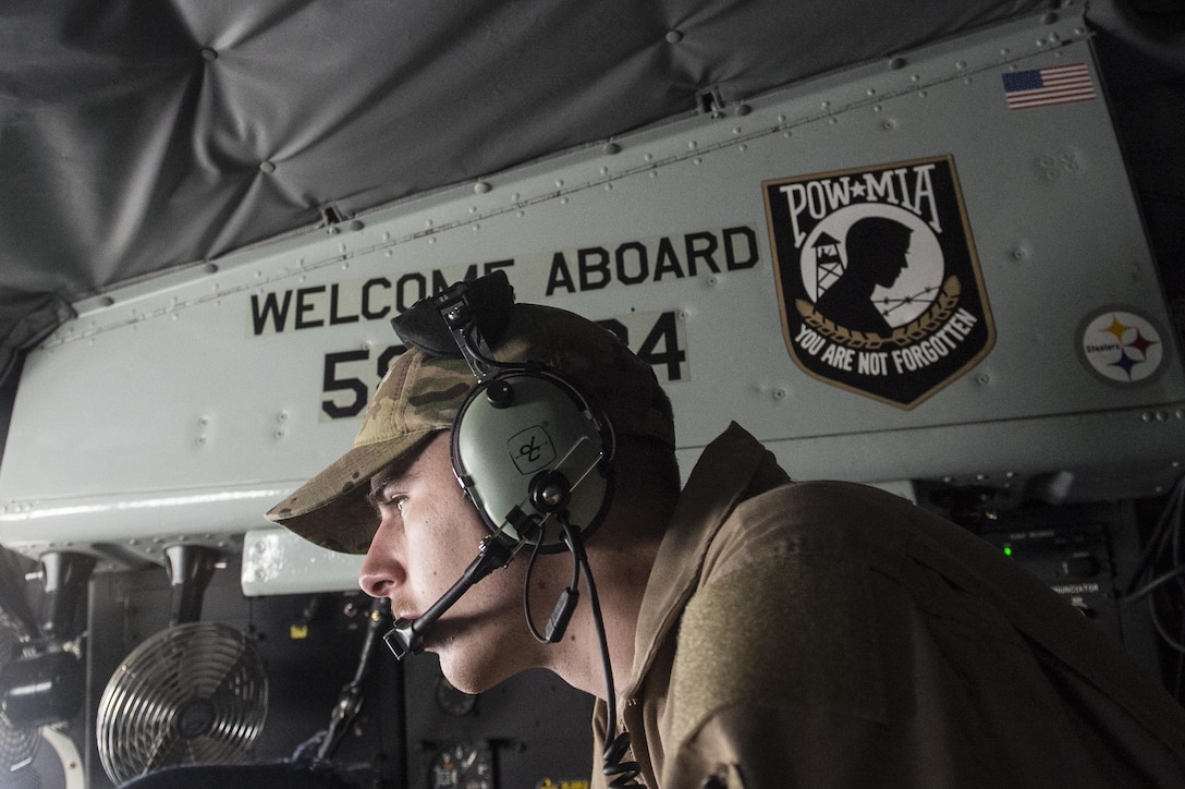 U.S. Air Force Airman 1st Class Garrett Peirce prepares to fly on a KC-135 Stratotanker from Al Udeid Air Base, Qatar, Dec. 29, 2015. Peirce is a boom operator assigned to the 340th Expeditionary Air Refueling Squadron, deployed from the 92nd Air Refueling Wing at Fairchild Air Force Base, Wash. U.S. Air Force photo by Staff Sgt. Corey Hook