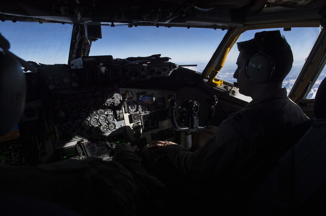 U.S. Air Force Capt. John Christy flies a KC-135 Stratotanker over Afghanistan, Dec. 29, 2015. Christy is a pilot assigned to the 340th Expeditionary Air Refueling Squadron, deployed from the 92nd Air Refueling Wing at Fairchild Air Force Base, Wash. U.S. Air Force photo by Staff Sgt. Corey Hook