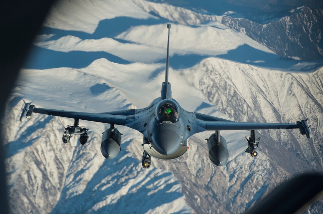 A U.S. Air Force F-16 Fighting Falcon flies over Afghanistan as part  of the Resolute Support mission, Dec. 29, 2015. U.S. Air Force photo by Staff Sgt. Corey Hook