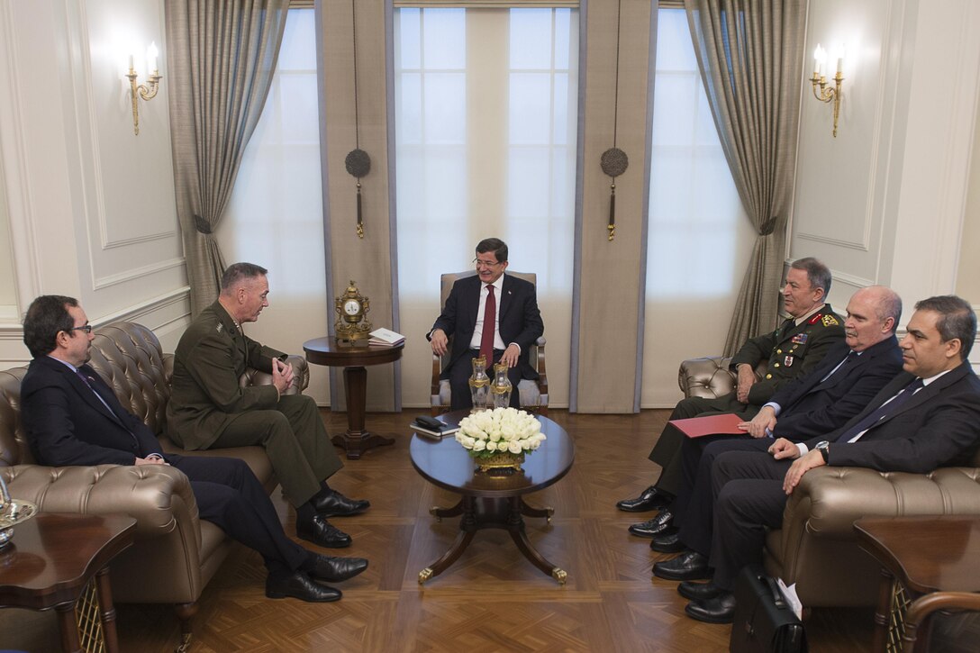 U.S. Ambassador to Turkey John R. Bass, left, and U.S. Marine Corps Gen. Joseph F. Dunford Jr., chairman of the Joint Chiefs of Staff, meet with Turkish Prime Minister Ahmed Davutoglu at his official residence in Ankara, Turkey, Jan. 6, 2016. DoD photo by Navy Petty Officer 2nd Class Dominique A. Pineiro