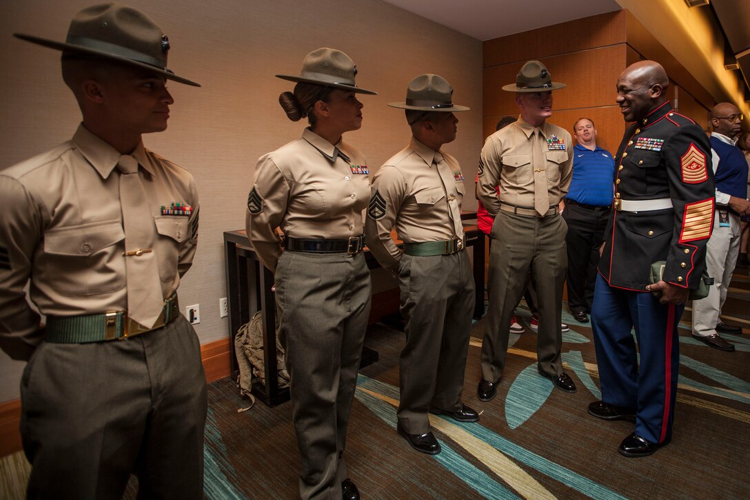 The 18th Sergeant Major of the Marine Corps, Ronald L. Green, greets Drill Instructors at the Semper Fidelis All-American Bowl Banquet in Carson, CA, Jan. 2, 2016. The dinner was held the night before the bowl game and featured guest speaker Cpl. Kyle Carpenter. (U.S. Marine Corps photo by Sgt. Melissa Marnell, Office of the Sergeant Major of the Marine Corps/Released)