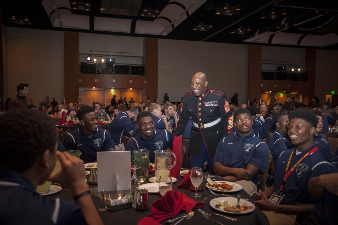 The 18th Sergeant Major of the Marine Corps, Ronald L. Green, speaks to players at the Semper Fidelis All-American Bowl Banquet in Carson, CA, Jan. 2, 2016. The dinner was held the night before the bowl game and featured guest speaker Cpl. Kyle Carpenter. (U.S. Marine Corps photo by Sgt. Melissa Marnell, Office of the Sergeant Major of the Marine Corps/Released)