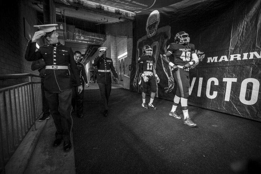 The 18th Sergeant Major of the Marine Corps, Ronald L. Green (center) attends the Semper Fidelis All-American Bowl at the StubHub Center in Carson, CA, Jan. 3, 2016. The annual bowl game is made up of high school seniors hand selected from around the country to make up west and east coast teams. (U.S. Marine Corps photo by Sgt. Melissa Marnell, Office of the Sergeant Major of the Marine Corps/Released)