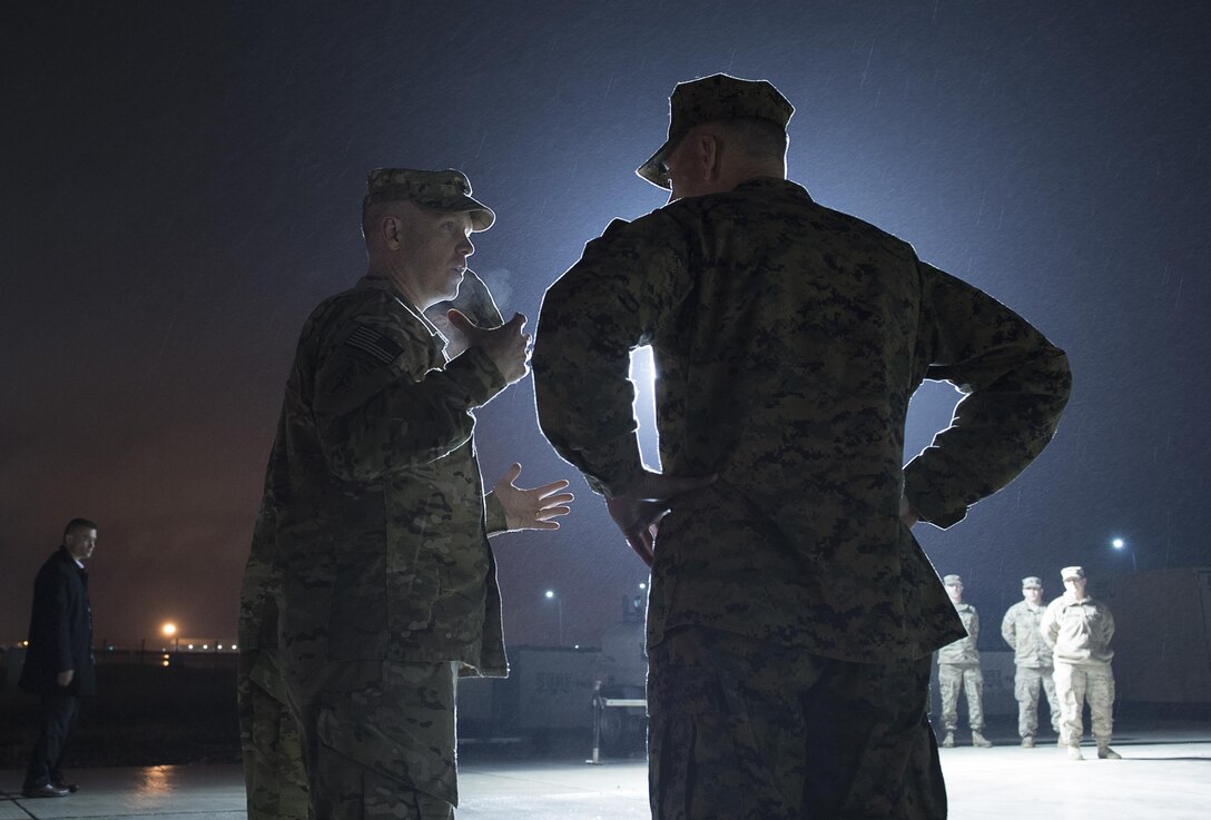U.S. Army Col. Kevin Leahey, left, commander, Combined Joint Special Operations Task Force, briefs U.S. Marine Corps Gen. Joseph F. Dunford Jr., right, chairman of the Joint Chiefs of Staff, on Incirlik Air Base, Turkey, Jan. 6, 2016. DoD photo by Navy Petty Officer 2nd Class Dominique A. Pineiro