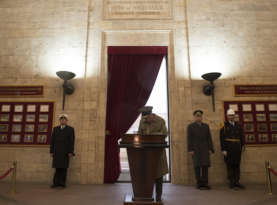 U.S. Marine Corps Gen. Joseph F. Dunford Jr., chairman of the Joint Chiefs of Staff, signs a guest book after participating in a wreath-laying ceremony at Anitkabir in Ankara, Turkey, Jan. 6, 2016. DoD photo by Navy Petty Officer 2nd Class Dominique A. Pineiro