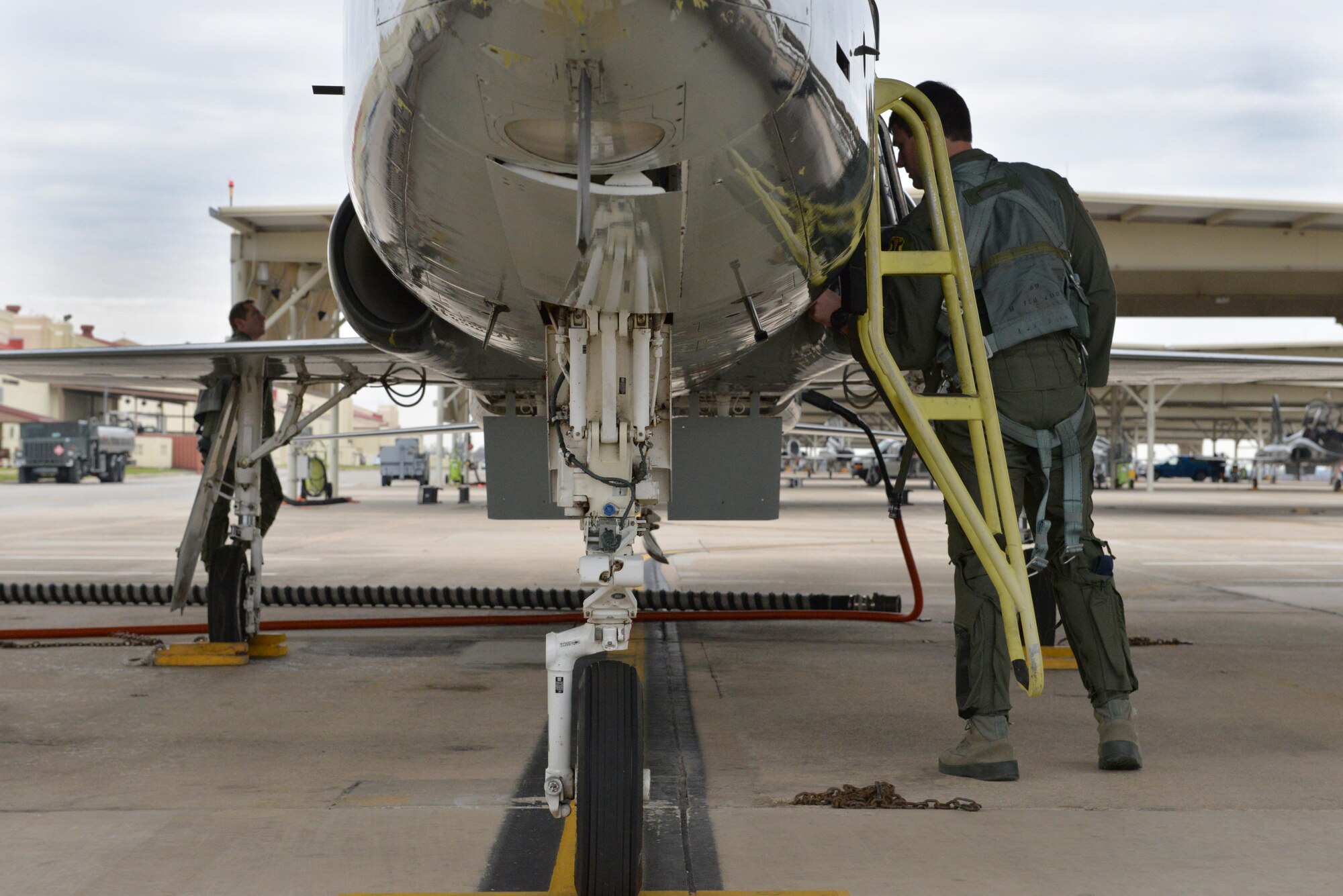 Capt. Chris Umphres (left), 435th Fighter Training Squadron flight commander and instructor pilot, conducts a pre-flight check of a T-38 with First Lt. Kaleb Jenkins, 435th FTS student pilot, before a training mission Jan. 5 at Joint Base San Antonio-Randolph, Texas. (U.S. Air Force photo by Tech. Sgt. Beth Anschutz)