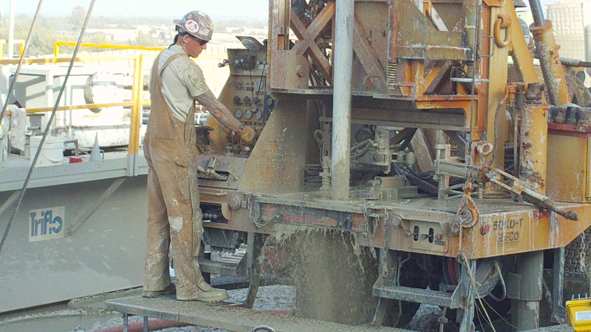 Tech. Sgt. John Sinner works on a water well during a deployment to Afghanistan in 2010. Before becoming an academy military trainer at the U.S. Air Force Academy in 2013, Sinner was an Air Force civil engineer paving and heavy equipment operator. (U.S. Air Force photo) 
