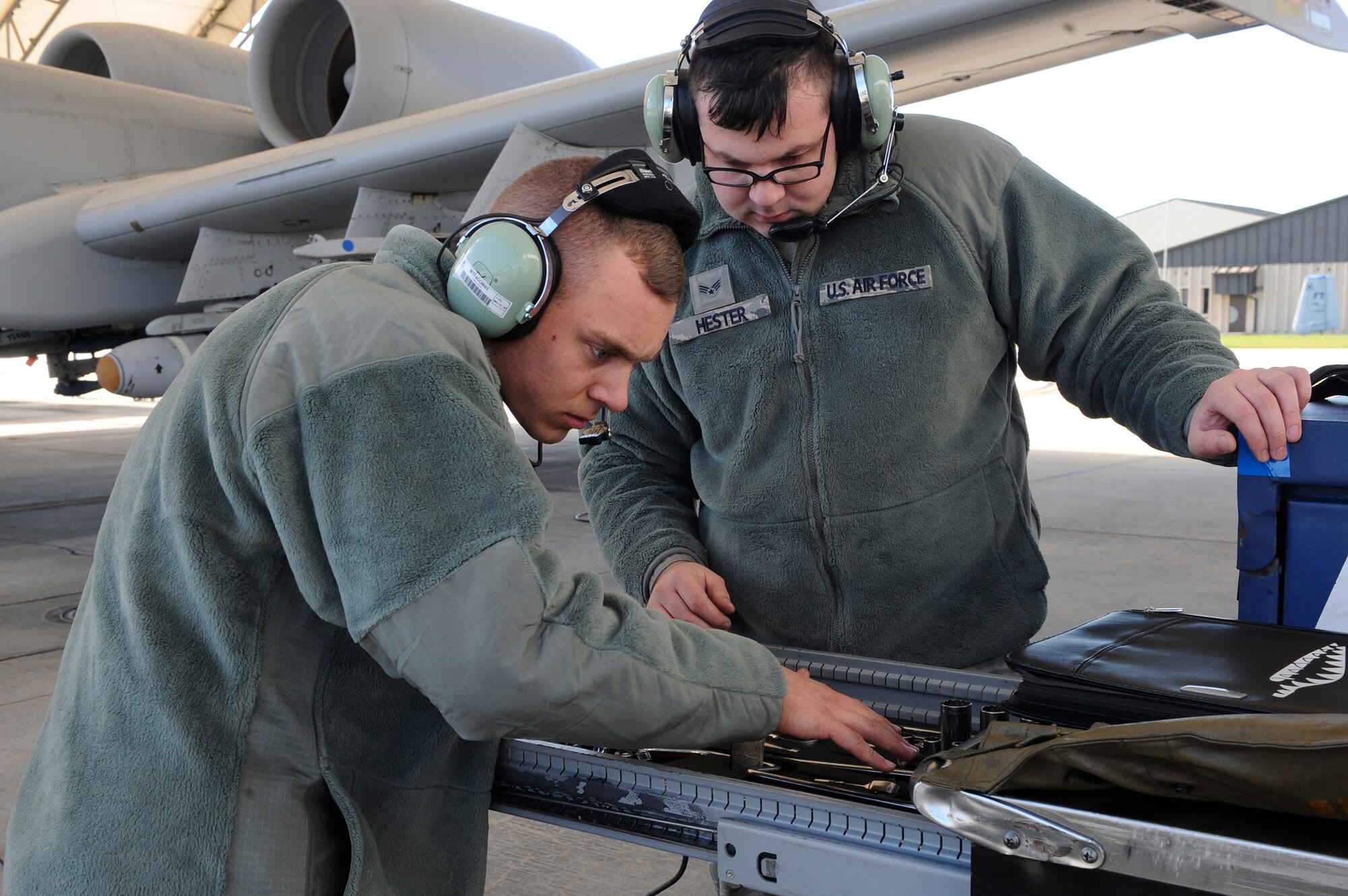 U.S. Air Force Airman 1st Class Chris Renfroe, 74th Aircraft Maintenance Unit crew chief, left, and Senior Airman Tyler Hester, 476th Maintenance Squadron crew chief, take inventory of their toolbox before launching an A-10C Thunderbolt II, Jan. 5, 2016, at Moody Air Force Base, Ga. Crew chiefs take account of everything in the toolbox before a flight to prevent damages to the aircraft. (U.S. Air Force photo by Airman 1st Class Kathleen D. Bryant/Released)


