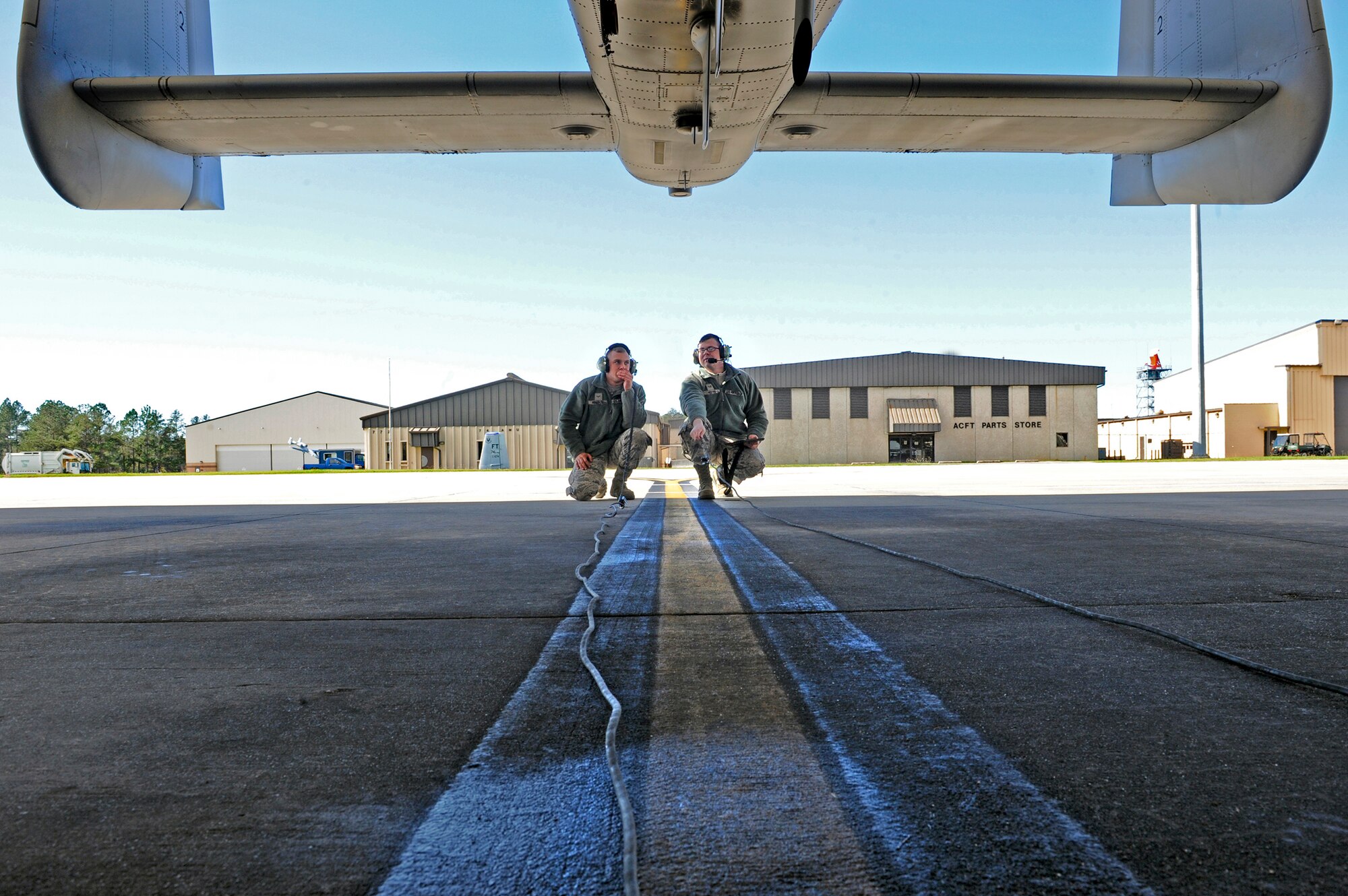 U.S. Air Force Airman 1st Class Chris Renfroe, 74th Aircraft Maintenance Unit crew chief, left, and Senior Airman Tyler Hester, 476th Maintenance Squadron crew chief, perform a flight control check on an A-10C Thunderbolt II prior to launching, Jan. 5, 2016, at Moody Air Force Base, Ga. The crew chiefs perform aircraft launches with pilots regularly to keep them qualified. (U.S. Air Force photo by Airman 1st Class Kathleen D. Bryant/Released)

