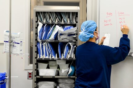 A U.S. Air Force Airman writes the number of specific equipment needed during an operation at Langley Air Force Base, Va., Oct. 27, 2015. Taking a count of all equipment before and after operations ensures none went missing during the operation. (U.S. Air Force photo by Airman 1st Class Derek Seifert)