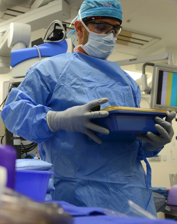 U.S. Air Force Airman 1st Class Gustavo Lombana, 633rd Medical Group surgical technician, ensures equipment is sterile at Langley Air Force Base, Va., Oct. 27, 2015. Surgical technicians ensure doctors have the correct and clean equipment ready for all types of operations. (U.S. Air Force photo by Airman 1st Class Derek Seifert)