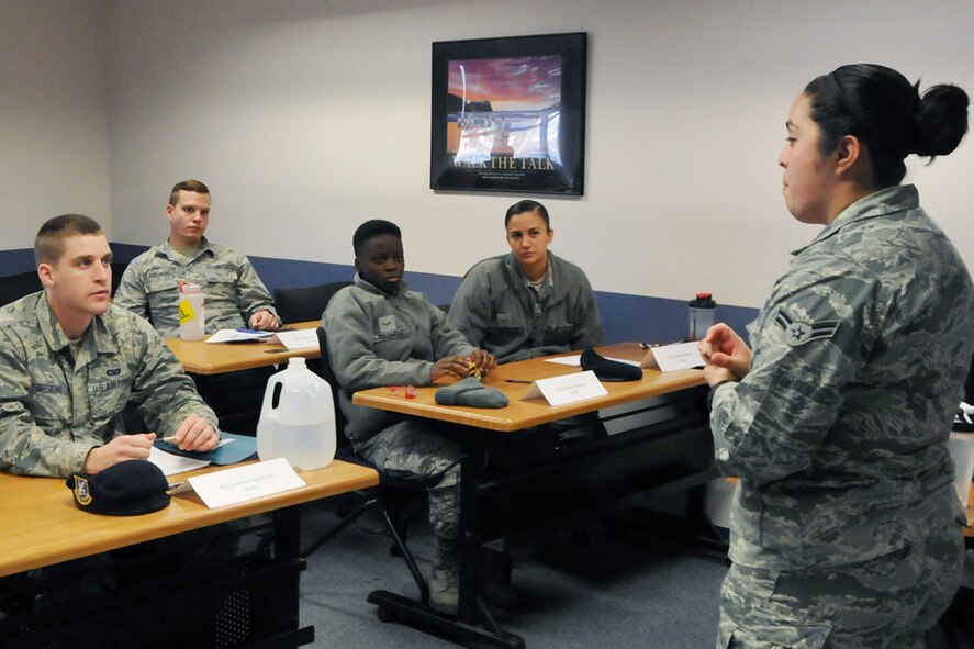 Airman 1st Class  Alyssa Lucero, 66th Medical Squadron Mental Health technician, discusses suicide prevention and substance abuse during a First Term Airman Center class at the Hanscom Education and Training Center Jan. 5. To assist Airmen during their first assignment, the First Term Airman Center is a week-long course that provides Airmen with the tools and information needed to have a successful start to their Air Force careers. (U.S. Air Force photo by Linda LaBonte Britt)