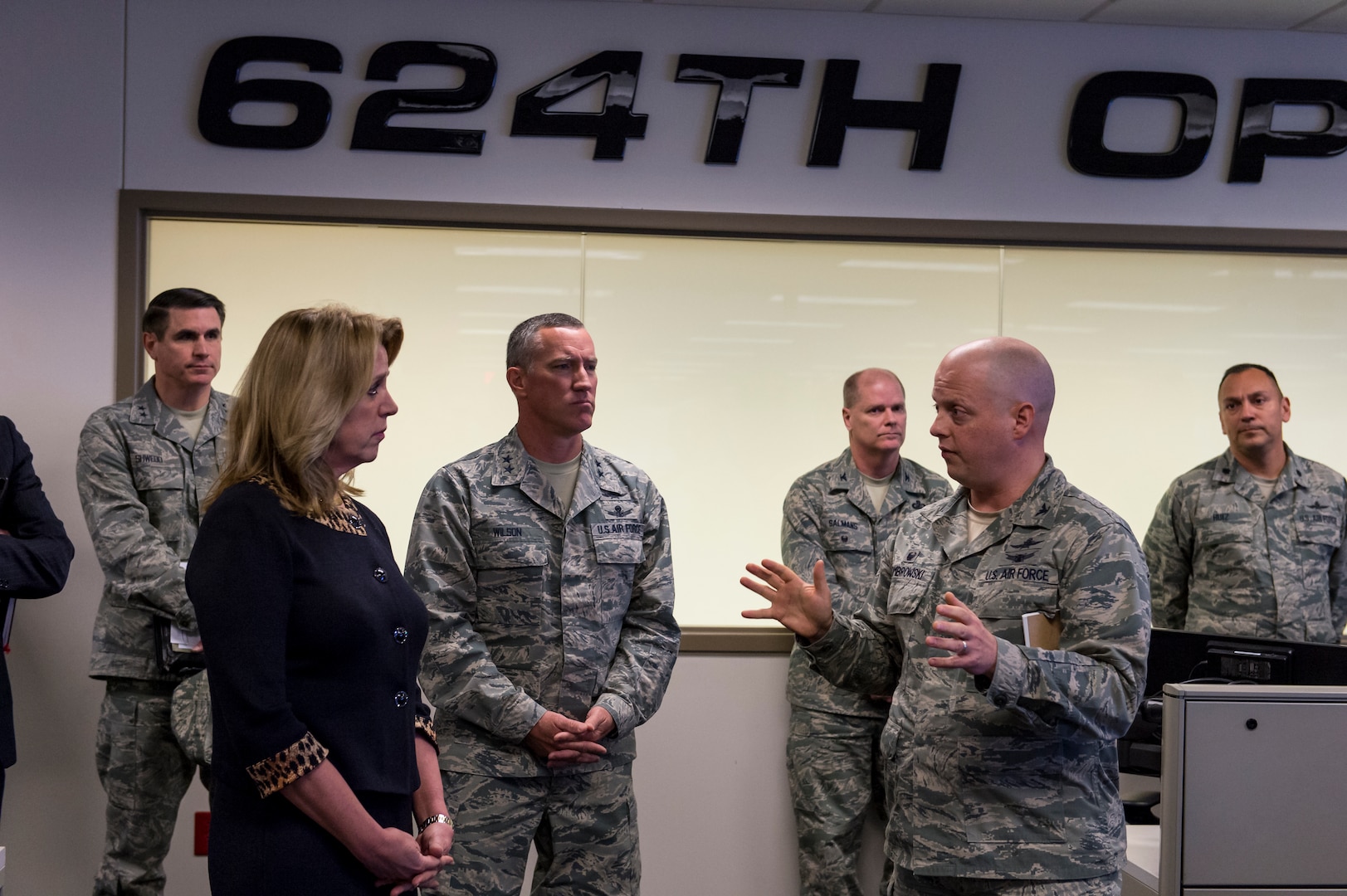 Secretary of the Air Force Deborah Lee James receives a briefing from Col. Michael Dombrowski, 624th Operations Center commander during a visit to JBSA - Lackland Jan 5. James and leaders of 24th and 25th Air Force discussed a series of cyber and global ISR initiatives focused on industry partnerships and innovation. (US Air Force photo by MSgt Luke Thelen)