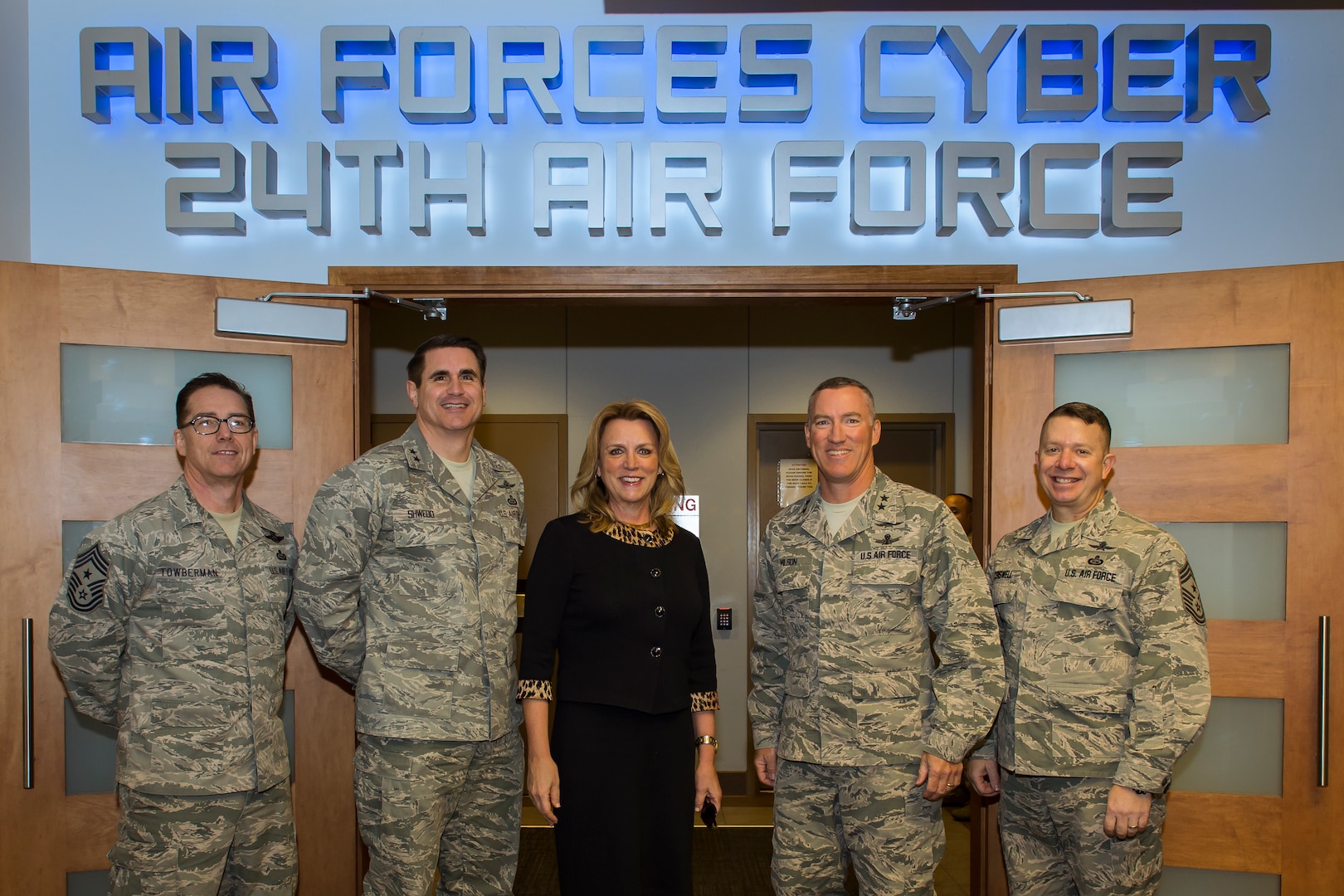 Secretary of the Air Force Deborah Lee James (center) poses with senior leaders from 24th and 25th Air Force during a visit at Joint Base San Antonio - Lackland, Texas Jan 5.  With James is Command Chief Master Sgt. Roger Towberman, 25th Air Force (left), Maj. Gen. B.J. Shwedo, 25th Air Force commander, Maj. Gen. Ed Wilson, 24th Air Force commander, and Command Chief Master Sgt. Brendan Criswell, 24th Air Force (right). (US Air Force photo by MSgt Luke Thelen) 
