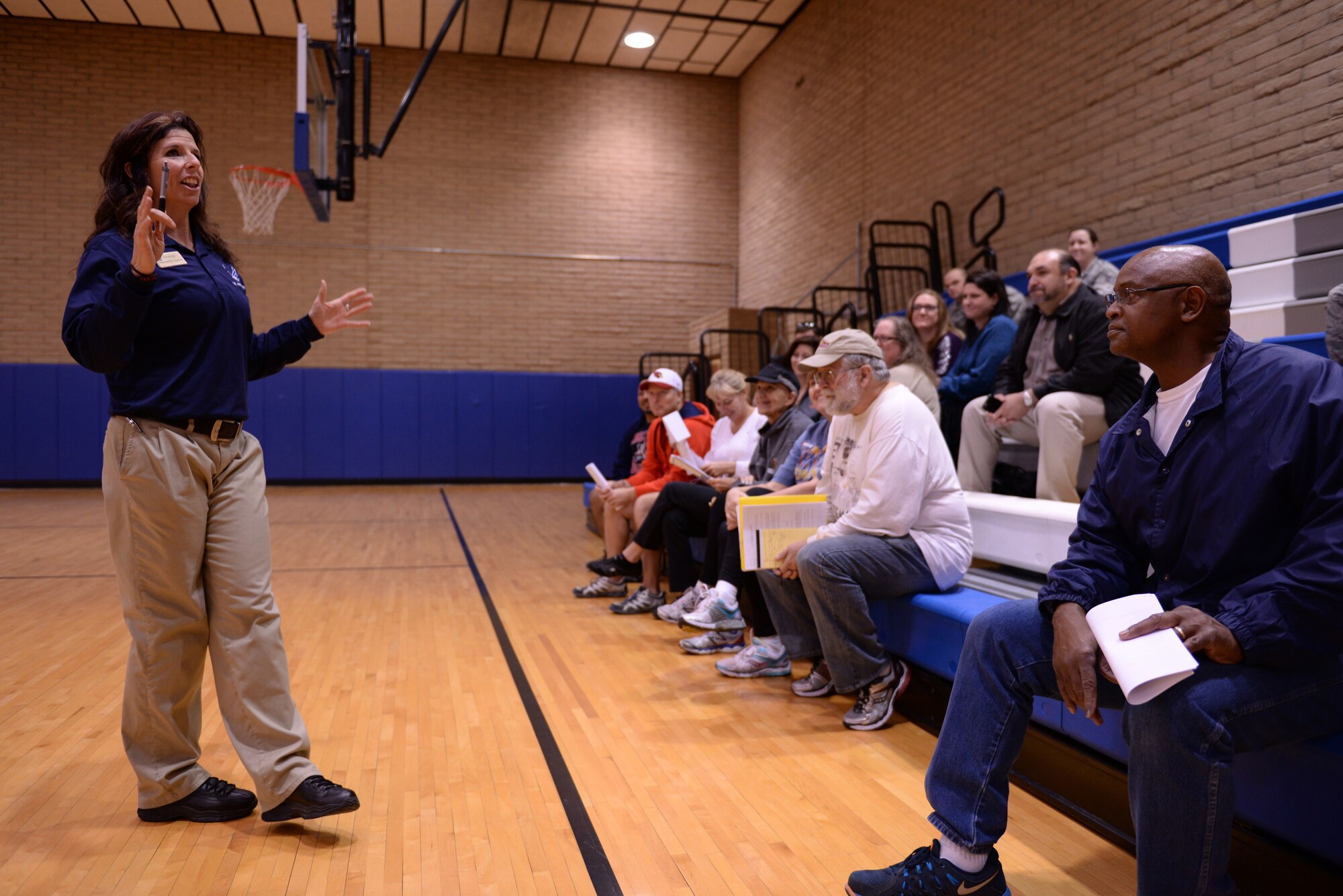 Sherri Biringer, Bryant Fitness Center fitness specialist supervisor, briefs the first group of contestants of the 2016 Luke Biggest Loser weight-loss competition, Jan. 4, 2015 at Luke Air Force Base. Anyone who wants to join the competition can do so for free at the front desk of the fitness center until Jan. 18th. (U.S. Air Force photo by Airman 1st Class Ridge Shan)