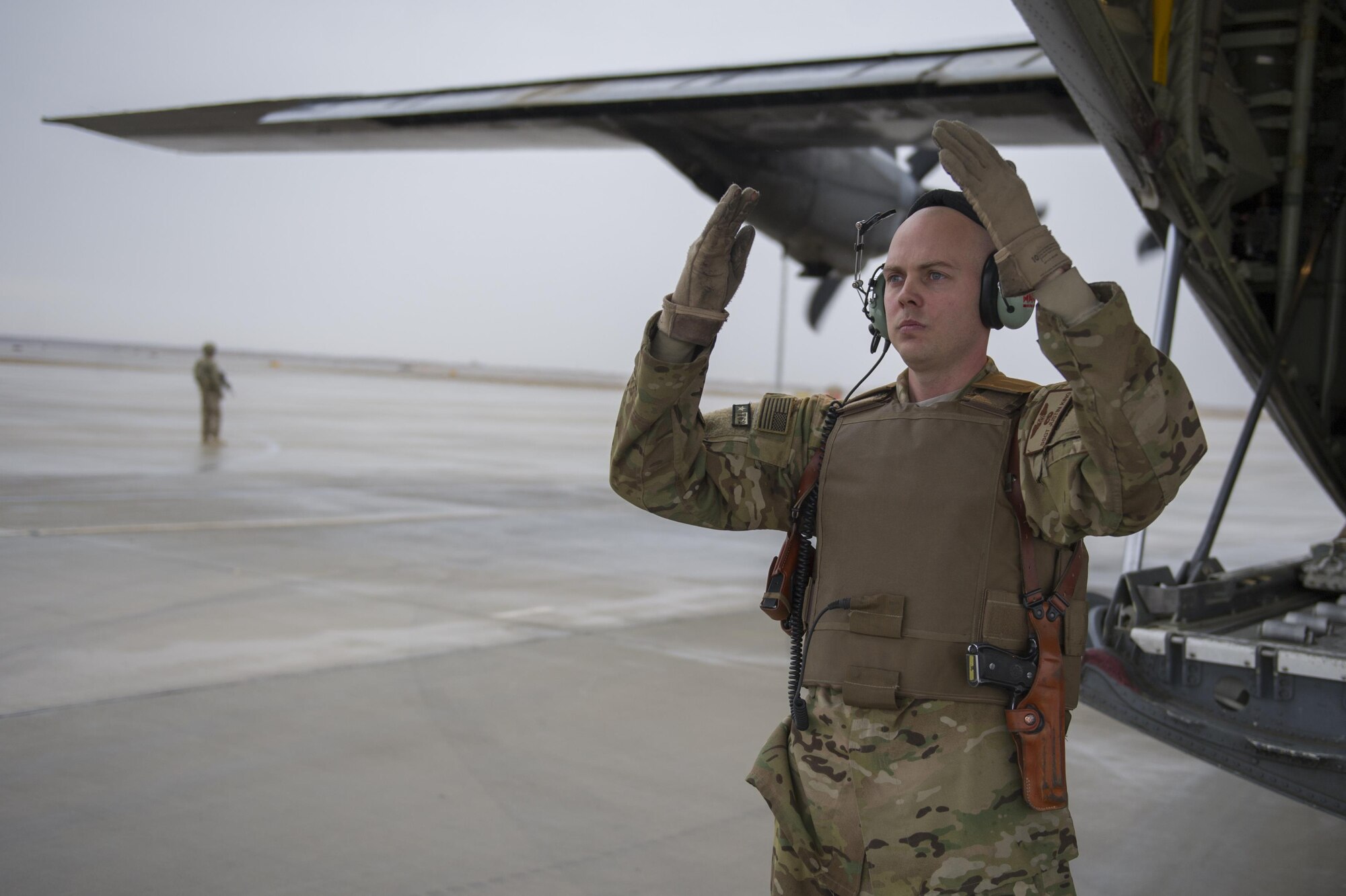 Staff Sgt. Justin King, 774th Expeditionary Airlift Squadron loadmaster, deployed from Dyess Air Force Base, Texas, guides a forklift toward the aft loading ramp of a C-130J Super Hercules at Camp Bastion, Afghanistan, Jan. 3, 2016. Loadmasters are responsible for calculating aircraft weight, balancing records and cargo manifests, conducting cargo and personnel airdrops, and troubleshooting in-flight problems. (U.S. Air Force photo/Tech. Sgt. Robert Cloys)