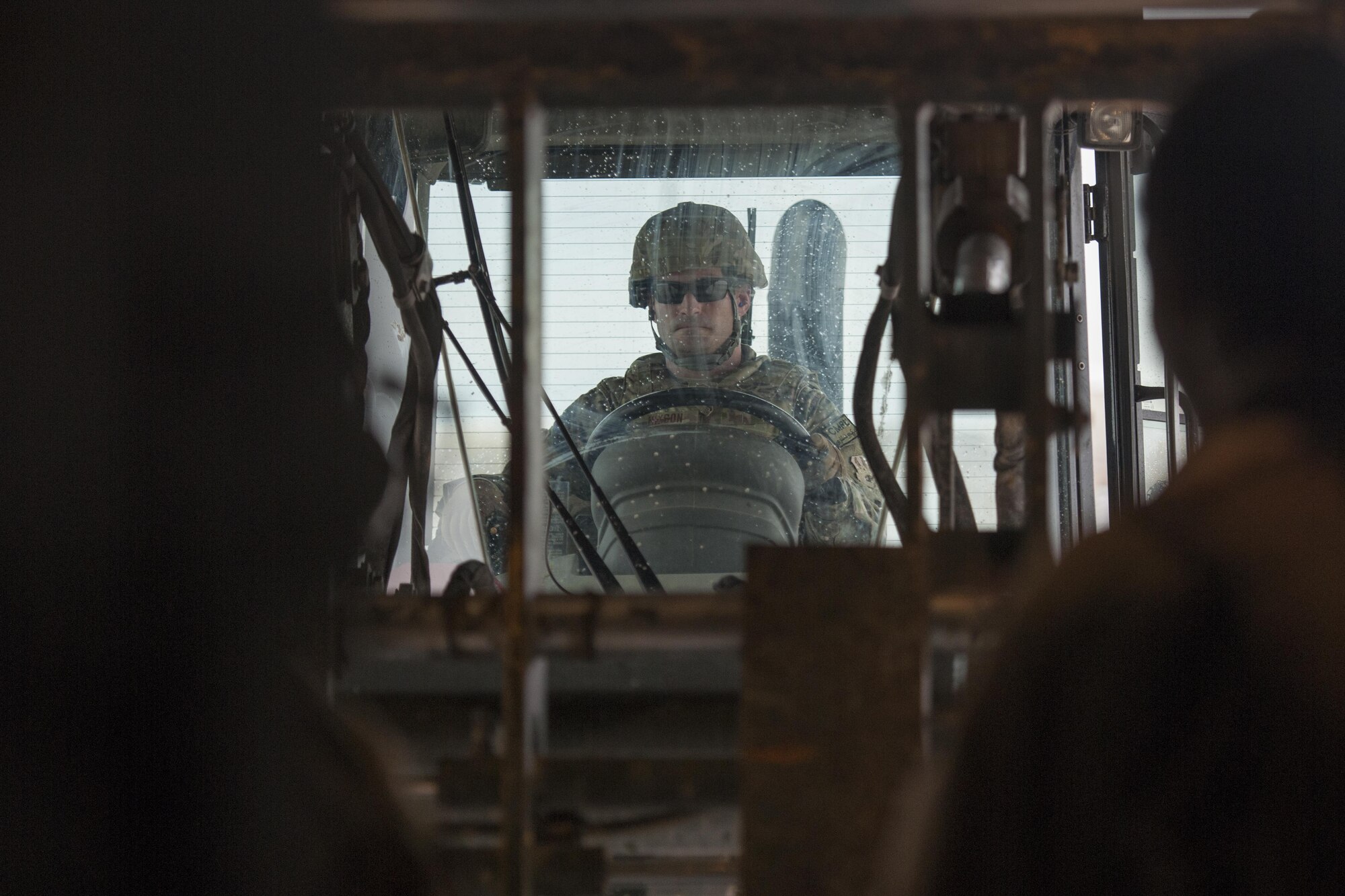 Master Sgt. Jason Hixon, Central Command Materiel Recovery Element team member, uses a forklift to move cargo from a C-130J Super Hercules at Camp Bastion, Afghanistan, Jan. 3, 2016. The CMRE team is designed to account for and redeploy war reserve assets after they have fulfilled their intended purpose, so they are available for use elsewhere. (U.S. Air Force photo/Tech. Sgt. Robert Cloys)