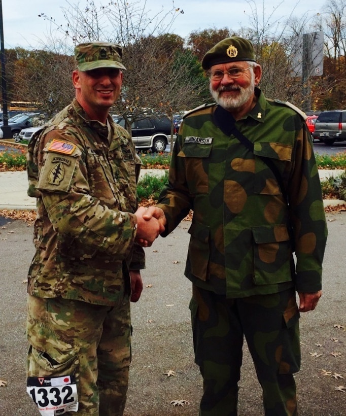 Army Reserve Sgt. 1st Class Ian J. Marano (left) stands with Dr. Nils Johansen, originator and sponsor for the Norwegian Foot March.