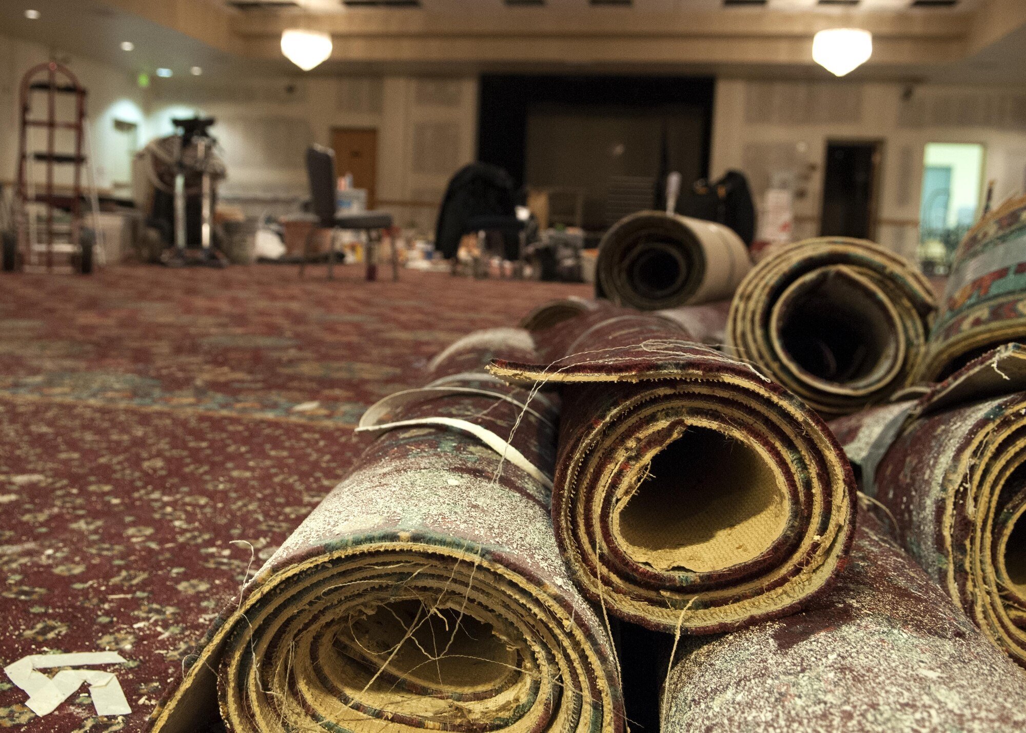 Removed carpet lies on the floor of the Trail’s End Event Center Dec. 7, 2015, on F.E. Warren Air Force Base, Wyo. The event center is currently undergoing renovations, but will ultimately re-open, partly for the use of Laramie County Community College culinary students. (U.S. Air Force photo by Airman 1st Class Malcolm Mayfield)