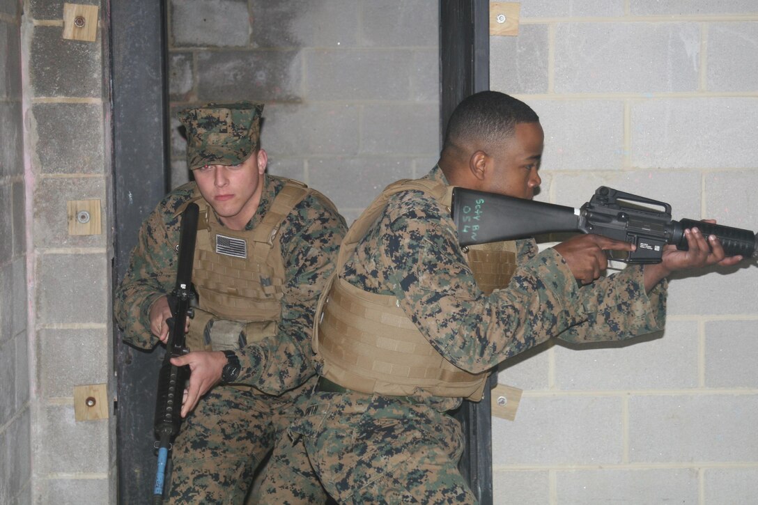 Marines from the Security Augmentation Force practice clearing a room of an active shooter during training Nov. 17.