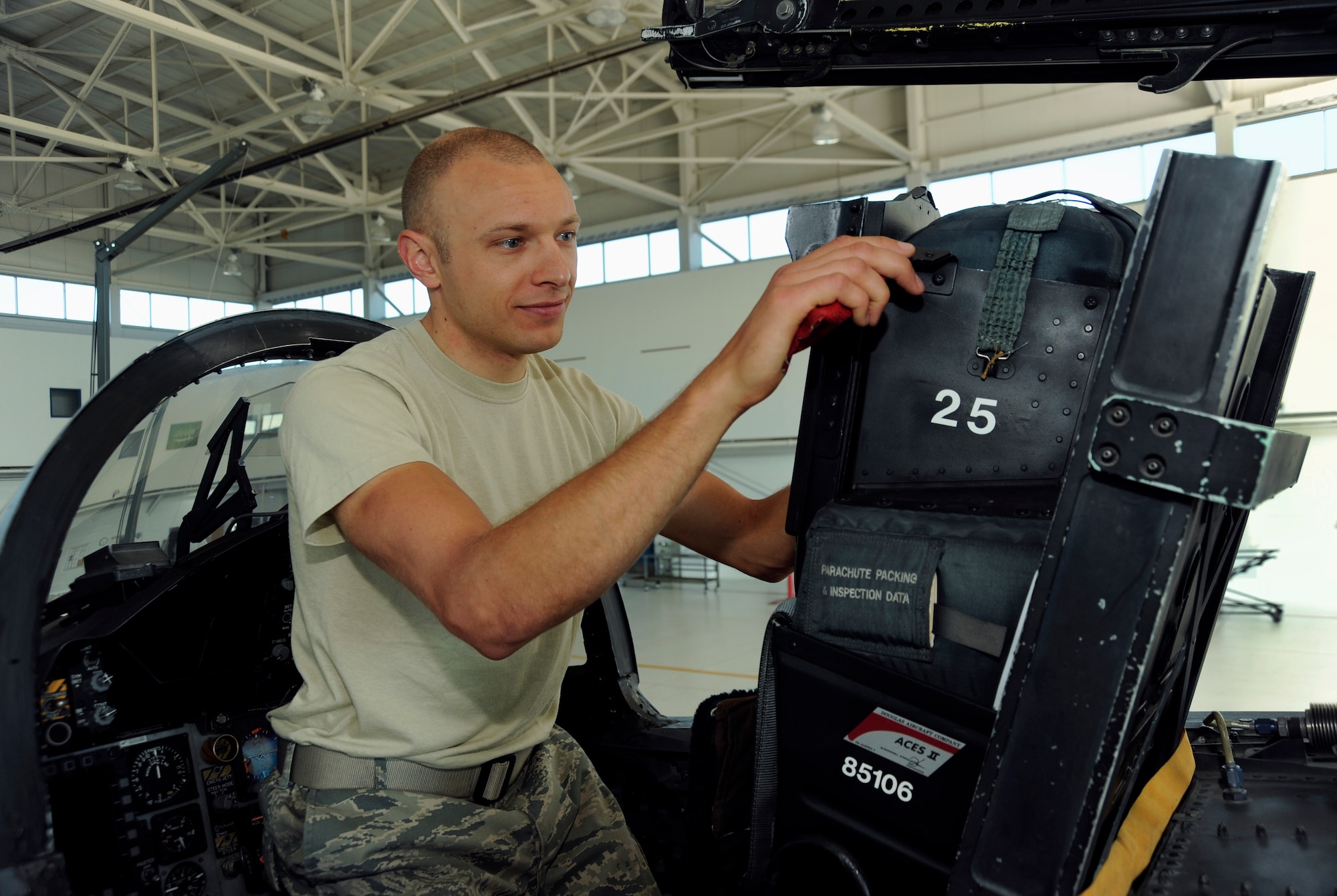 Tech. Sgt. Dwayne Farr, an egress repairman with Oregon Air National Guard’s 142nd Aircraft Maintenance Squadron, inspects an F-15 Strike Eagle seat at Portland Air National Guard Base, Ore., July 9, 2013. (U.S. Air National Guard Photo/Tech. Sgt. John Hughel)