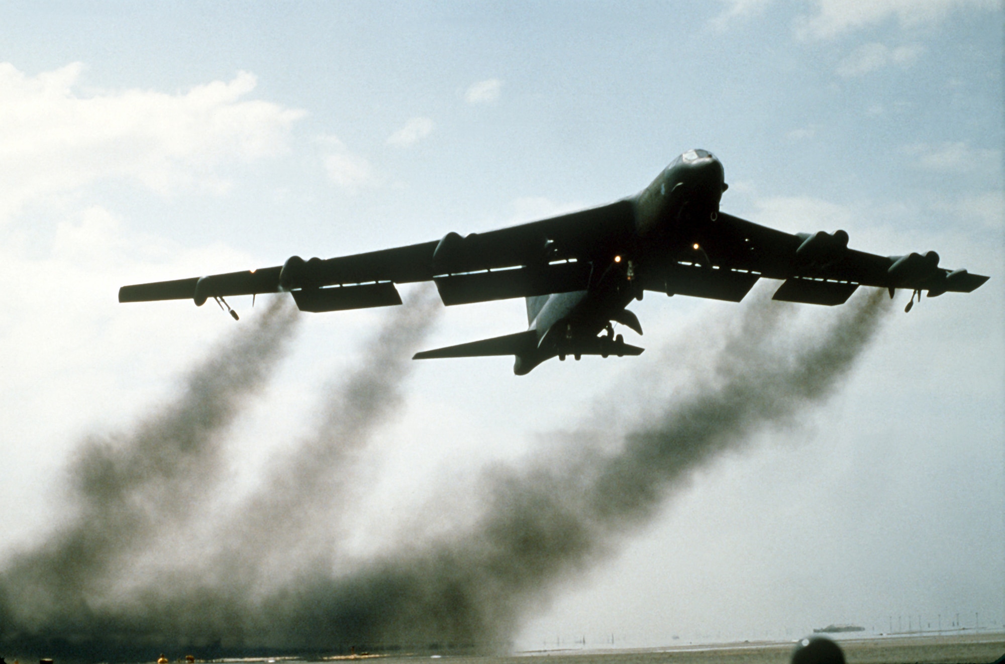 A B-52G Stratofortress aircraft takes off on its return flight to the United States after being deployed during Operation Desert Storm.
