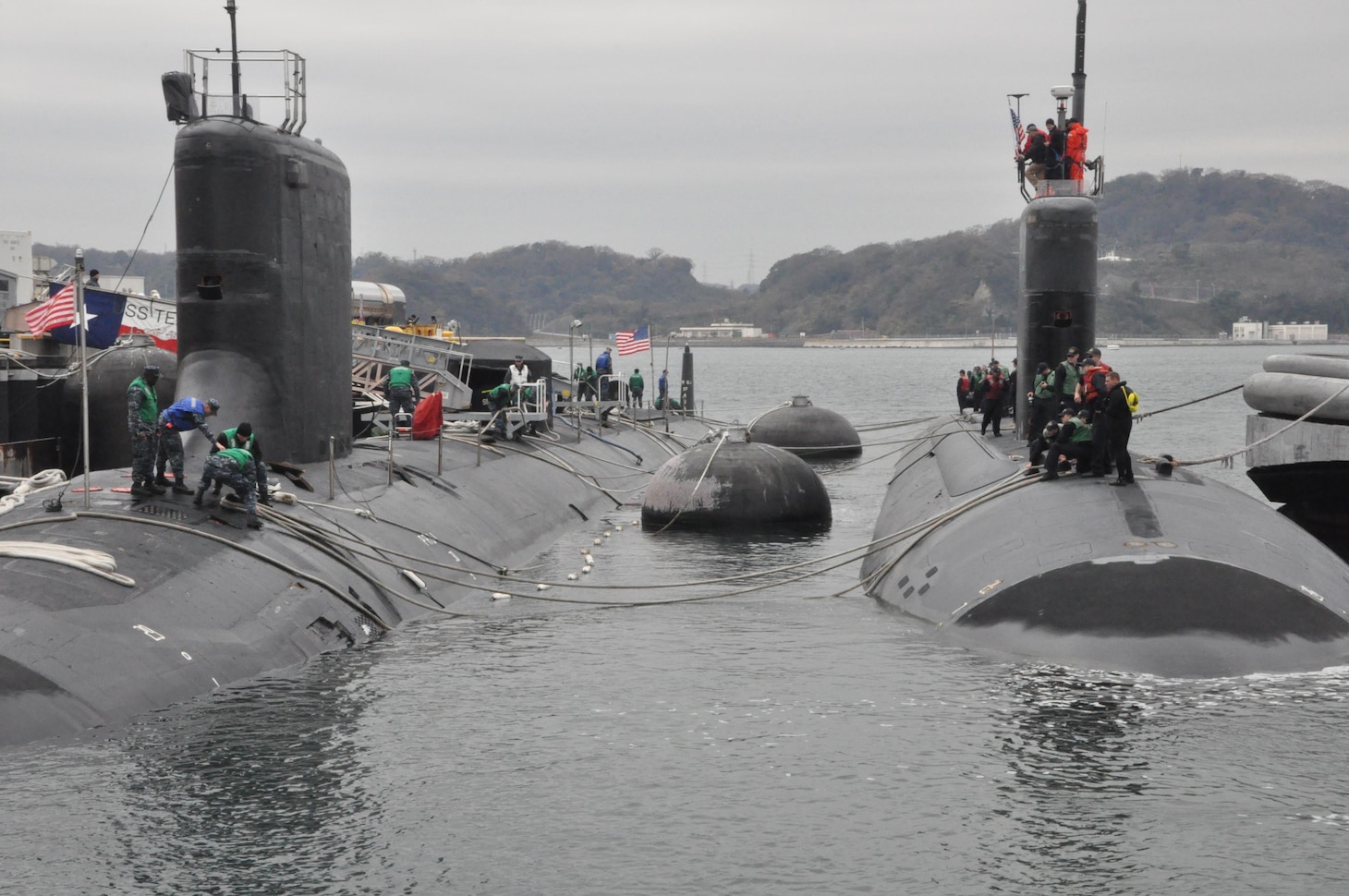 151223-N-OX023-
FLEET ACTIVITIES YOKOSUKA, Japan (December 23 2015) - USS Charlotte (SSN 766) moors outboard of USS Texas (SSN 775) at Commander, Fleet Activities Yokosuka. Commander, Submarine Group 7 provide support for submarines deployed to the 5th and 7th Fleet areas of operations. (U.S. Navy photo by Lt. Cmdr. Aaron Kakiel/ Released) 