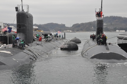 151223-N-OX023-
FLEET ACTIVITIES YOKOSUKA, Japan (December 23 2015) - USS Charlotte (SSN 766) moors outboard of USS Texas (SSN 775) at Commander, Fleet Activities Yokosuka. Commander, Submarine Group 7 provide support for submarines deployed to the 5th and 7th Fleet areas of operations. (U.S. Navy photo by Lt. Cmdr. Aaron Kakiel/ Released) 