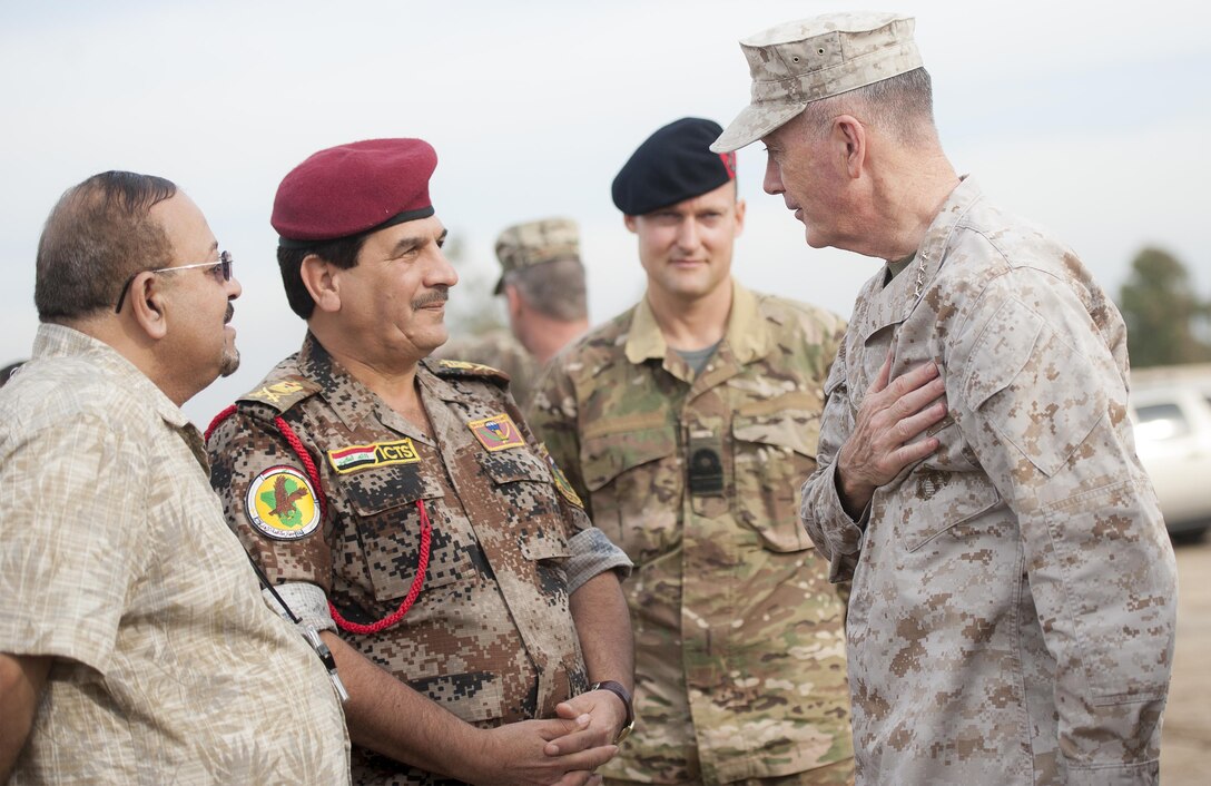 U.S. Marine Corps Gen. Joseph F. Dunford Jr., right, chairman of the Joint Chiefs of Staff, meets with a member of the Iraqi special operation forces at Area VI training site in Baghdad, Jan. 7, 2016. DoD photo by Navy Petty Officer 2nd Class Dominique A. Pineiro