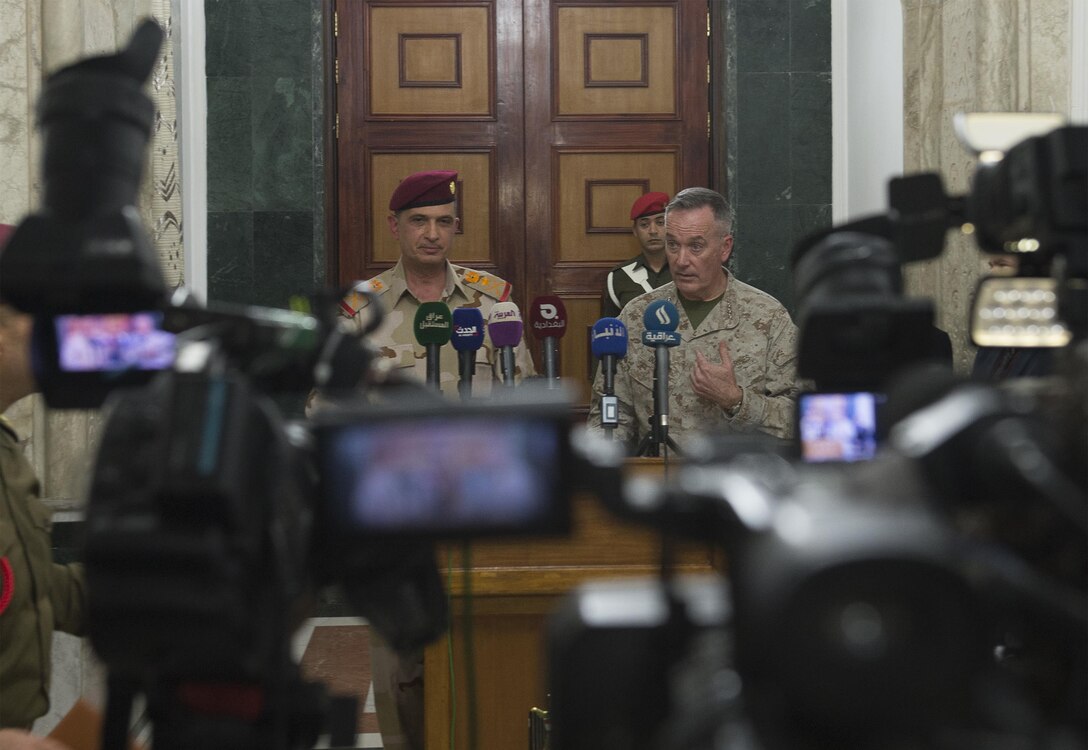 U.S. Marine Corps Gen. Joseph F. Dunford Jr., chairman of the Joint Chiefs of Staff, conducts a press conference with Iraqi Lt. Gen. Othman al-Ghanimi, Iraqi chief of defense in Baghdad, Jan. 7, 2016. DoD photo by Navy Petty Officer 2nd Class Dominique A. Pineiro