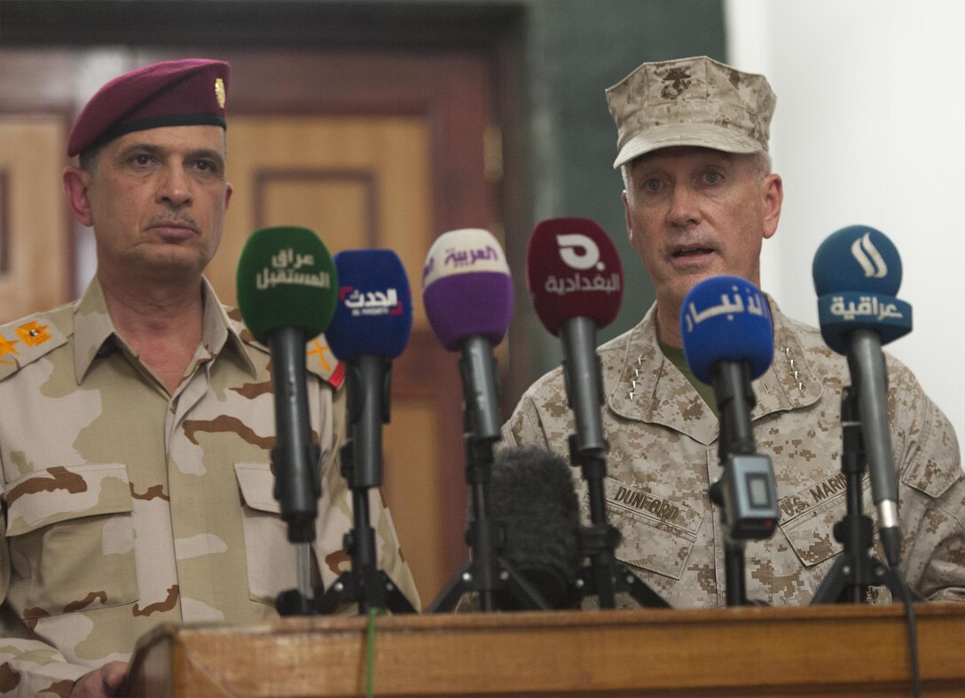 U.S. Marine Corps Gen. Joseph F. Dunford Jr., chairman of the Joint Chiefs of Staff, conducts a press conference with Iraqi Lt. Gen. Othman al-Ghanimi, Iraqi chief of defense in Baghdad, Jan. 7, 2016. DoD photo by Navy Petty Officer 2nd Class Dominique A. Pineiro