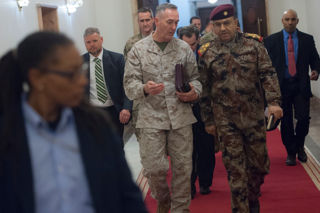 U.S. Marine Corps Gen. Joseph F. Dunford Jr., chairman of the Joint Chiefs of Staff, meets with a senior member of the Iraqi security forces before a meeting with Iraqi Prime Minister Haider al-Abadi at the Republican Palace in Baghdad, Jan. 7, 2016. DoD photo by Navy Petty Officer 2nd Class Dominique A. Pineiro