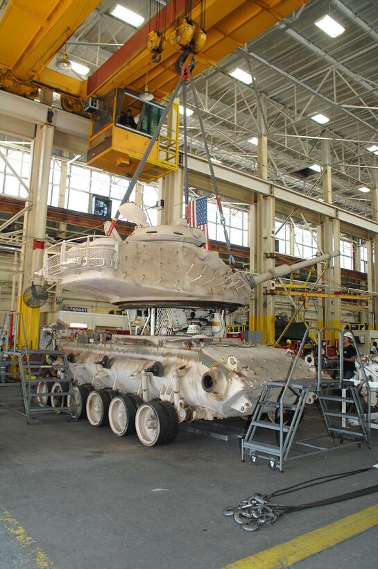 Genesis II, an M60A1 Main Battle Tank, is being dissembled as part of a restoration project between Marine Depot Maintenance Command and the National Museum of the Marine Corps, Oct. 27, 2015. The tank, along with an Assault Amphibious Vehicle and a Humvee, were restored at Production Plant Albany in Albany, Ga., and are scheduled to be displayed in the NMMC November 2018. 